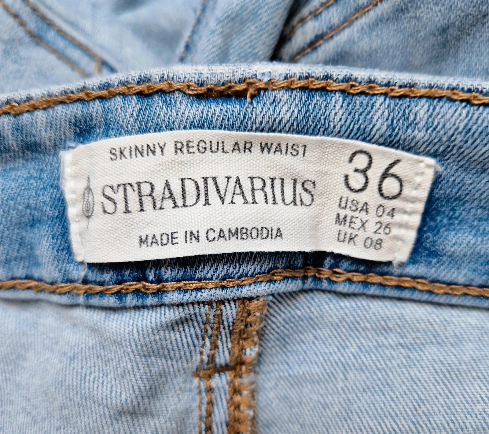 High-waist skinny jean met gaten – photo 3